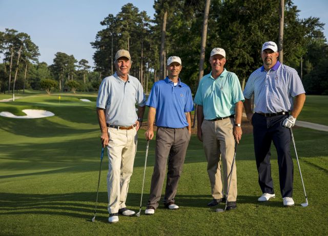 4 men golfing in Colonial Williamsburg