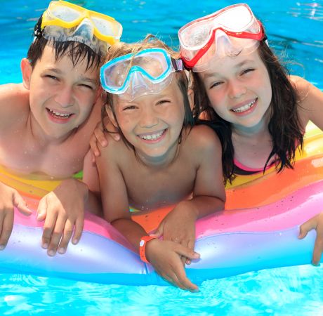 Smiling Children in Pool