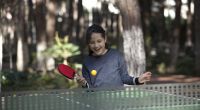 Young Girl Playing Table Tennis