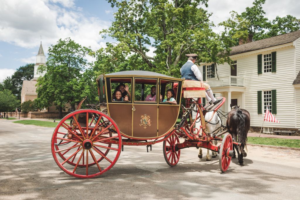 family in historic carriage